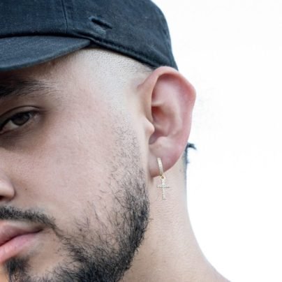 14K Yellow Gold earring on Ear of Men