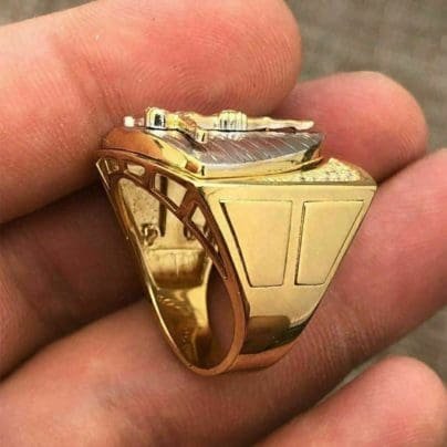 Jesus ring studded with diamond in hand