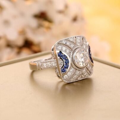Art Deco Style 1.18CT Round Cut White Diamond Center Vintage Sterling Silver Female Engagement and Wedding Ring Bezel Ring Sapphire Accents SJ2257