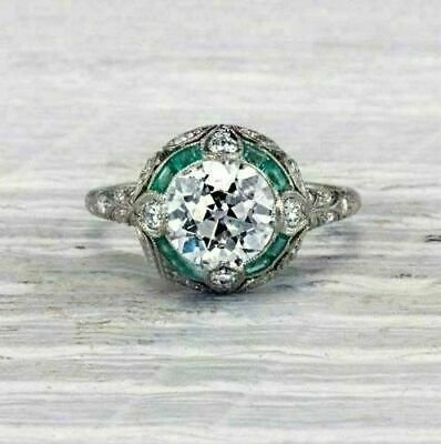 Natural Zambian Emerald - Daisy oval halo engagement ring